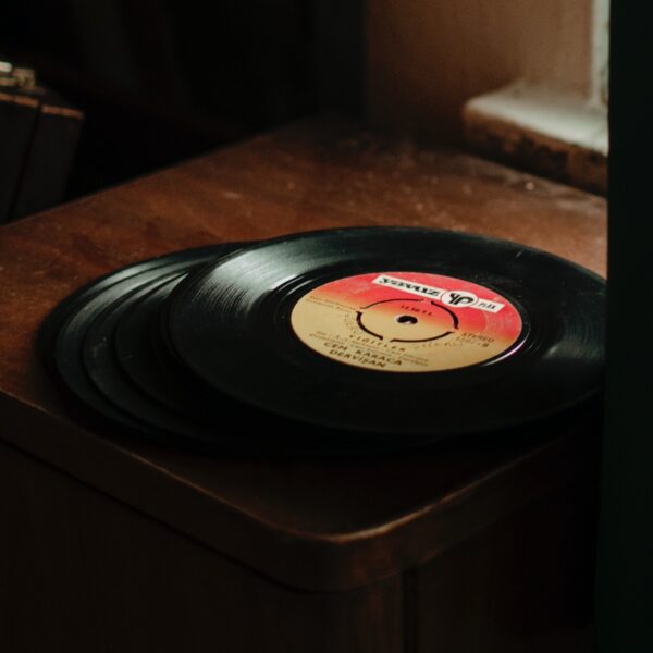 A record on top of a wooden table.